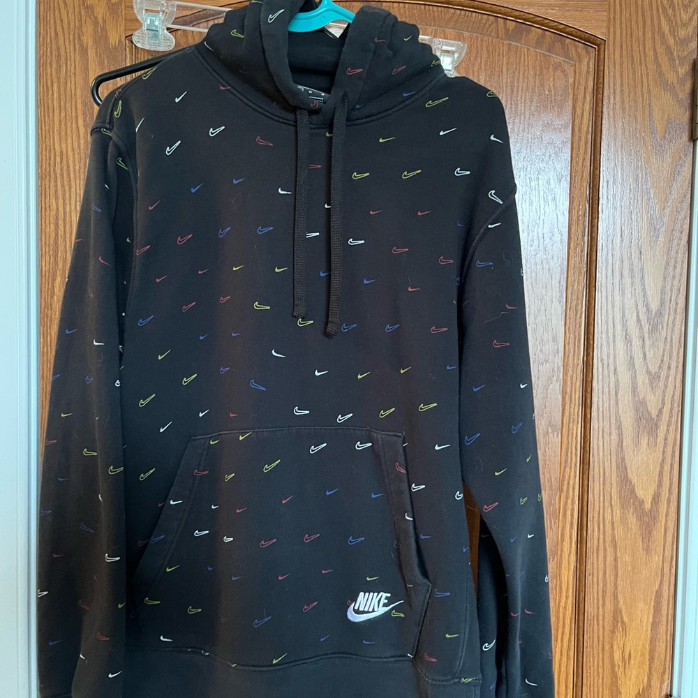 Nike Men's Black Hoodie with Multicolor Swoosh Pattern